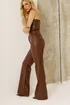 calca-de-couro-pu-kelliany-com-tachas-laterais-53425